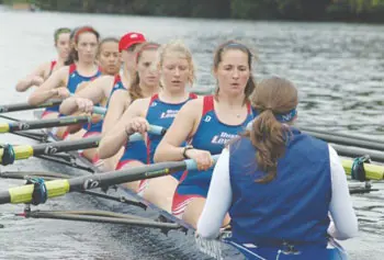 The River Hawks' varsity-eight crew team works out on the Merrimack River. UMass Lowell recently added women's rowing to give the school eight women's sports, part of ongoing efforts to provide equal opportunities for male and female athletes under Title IX, enacted 40 years ago.