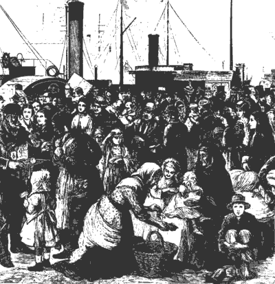 large group of people, childern and grownups  in front of sailing ships