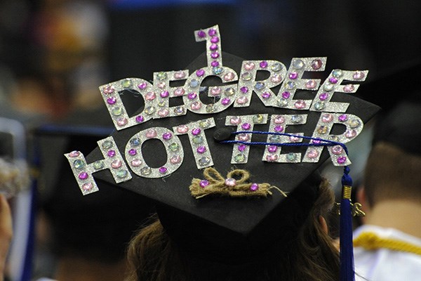 Mortar board that says 1 Degree Hotter