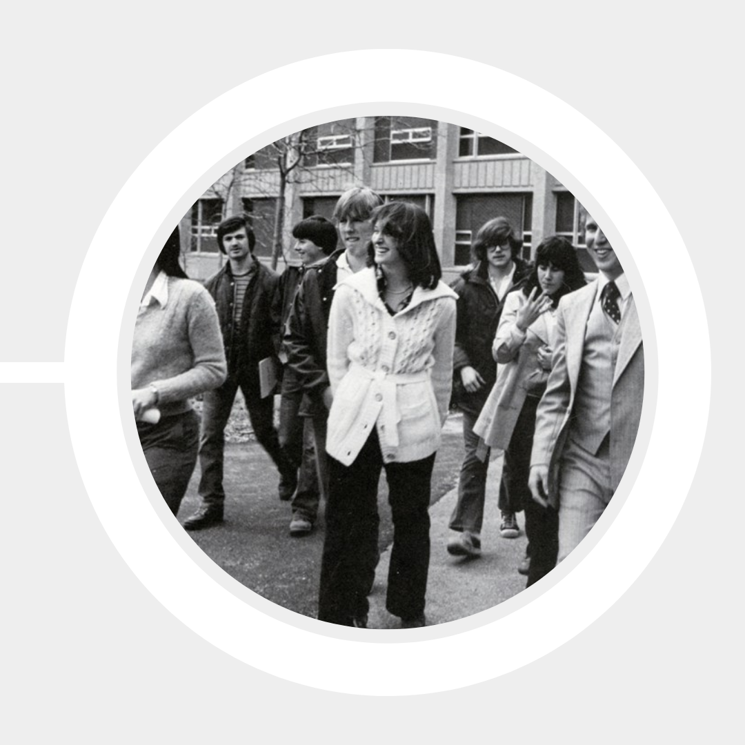 The first Nuclear Engineering graduates walk outside the Engineering Building (now Perry Hall).