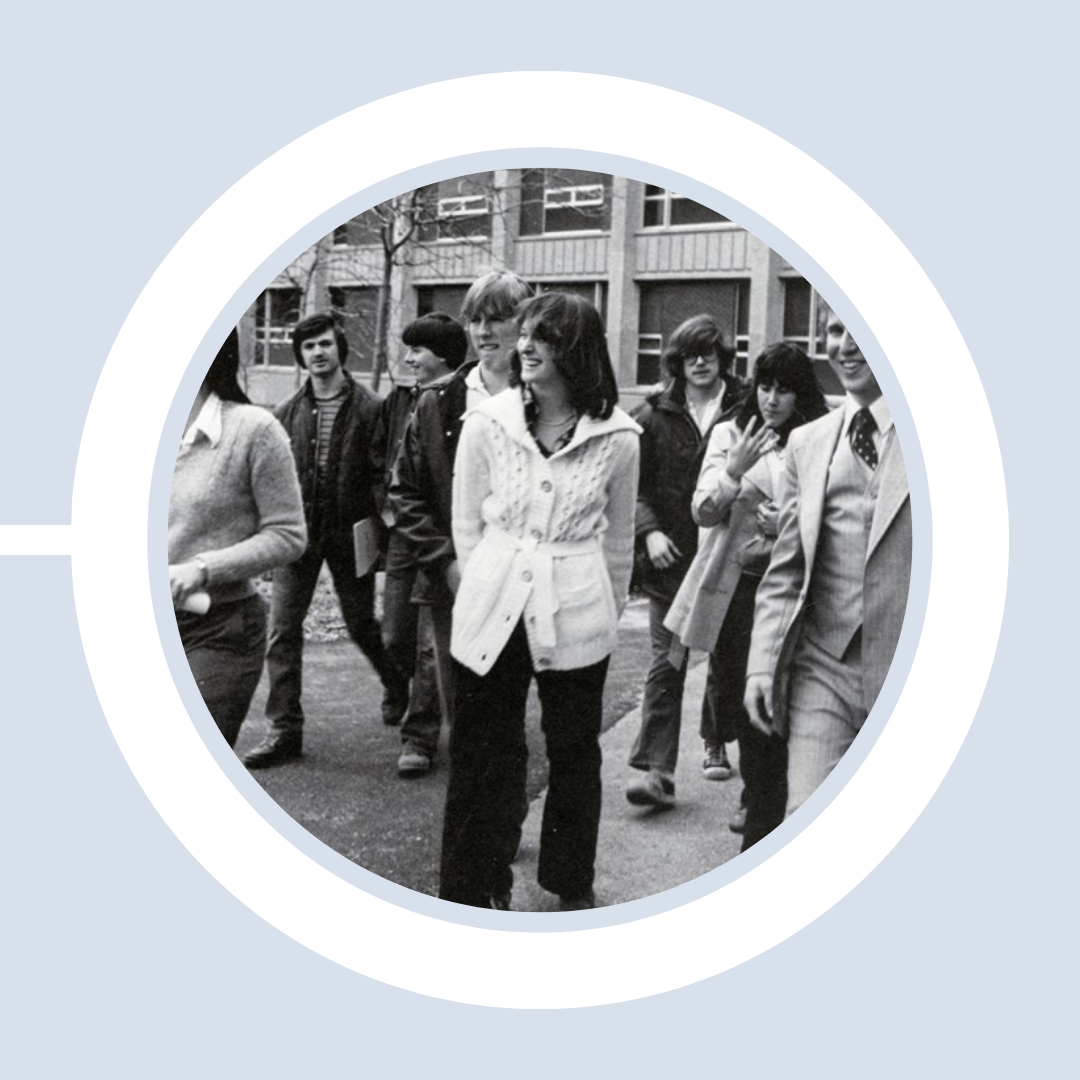 The first Nuclear Engineering graduates walk outside the Engineering Building (now Perry Hall).