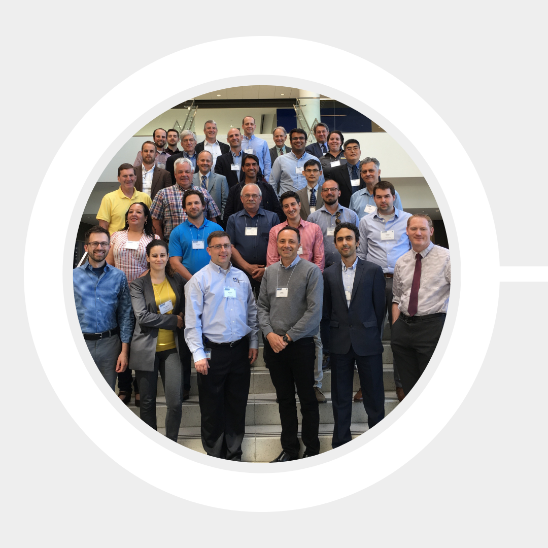 Engineers gather on a staircase to celebrate coming together.