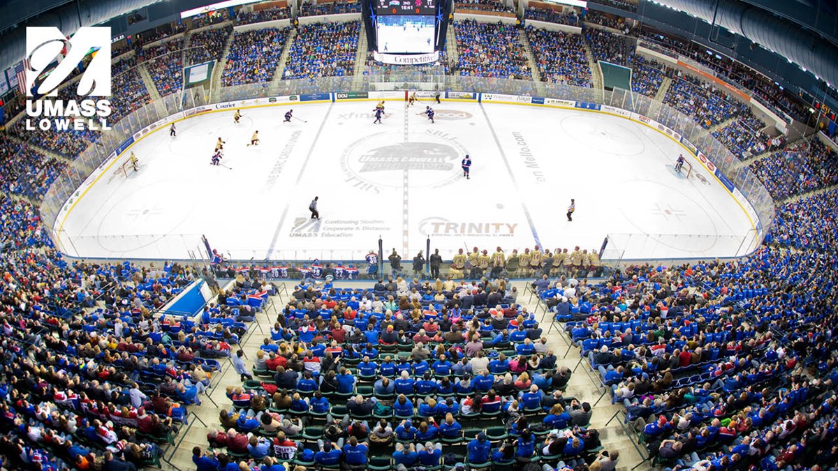 Zoom background displaying a bird's eye view of a hockey game and fans at the Tsongas Center with UML logo in the corner.