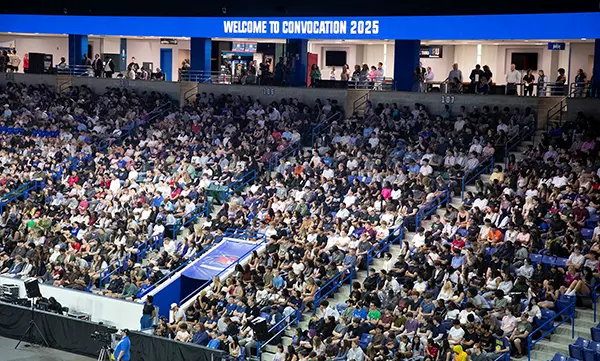 Image shows first-year and transfer students at the Tsongas Center attending 2025 Convocation.