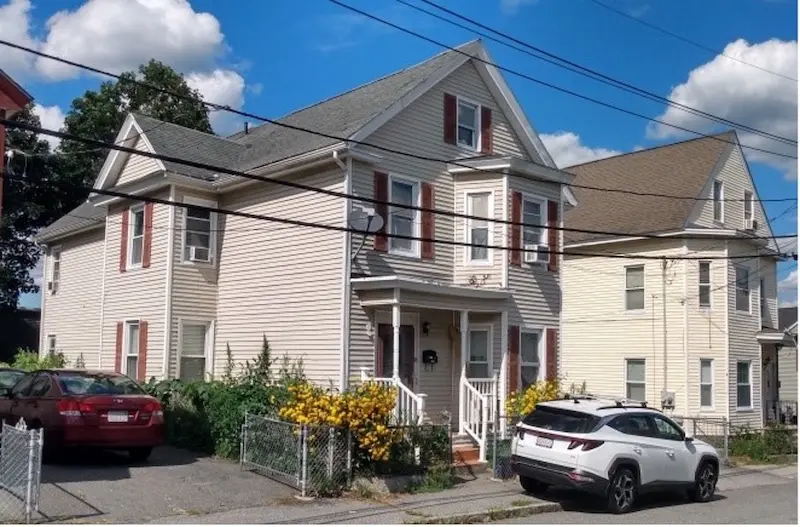 Exterior home with Greek Revival with Queen Anne elements.