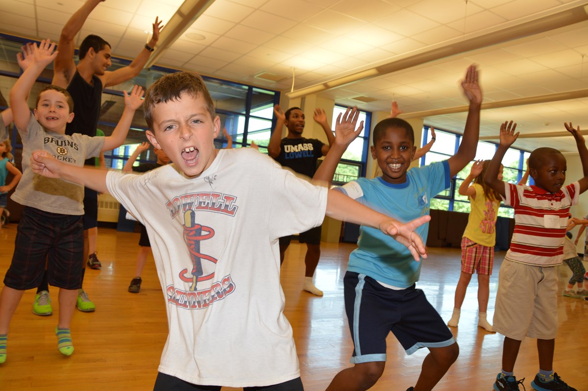 Kids dance in exercise class
