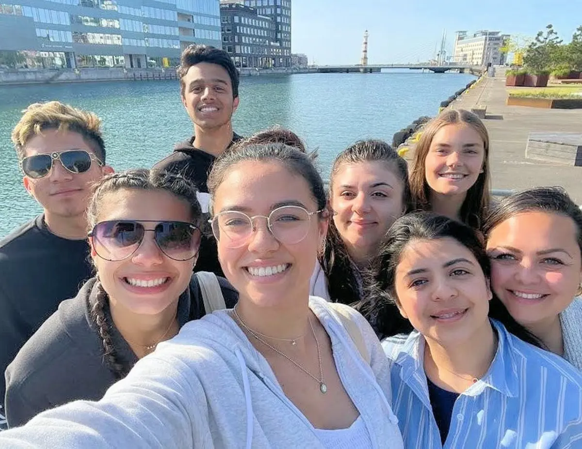 Business students pose for group photo in Copenhagen
