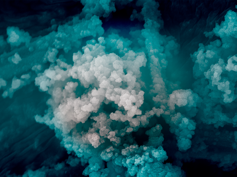 Blue and white beads on a dark blue background