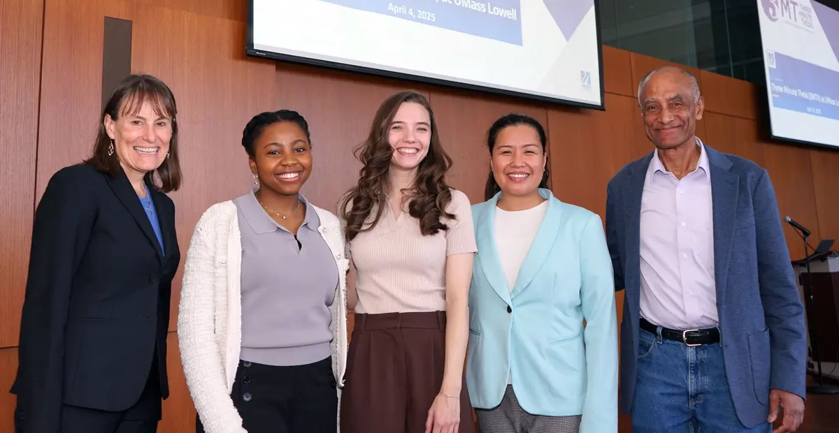 2025 3 Minute Thesis winners stand with the Head and Associate Head of the Graduate School.