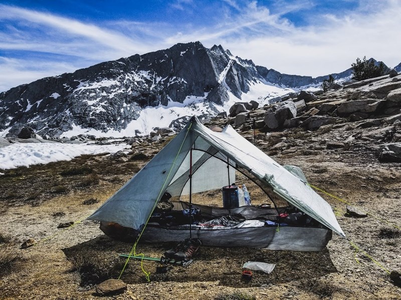 Kyle Soeltz's tent pitched against a backdrop of mountains on the Pacific Crest Trail