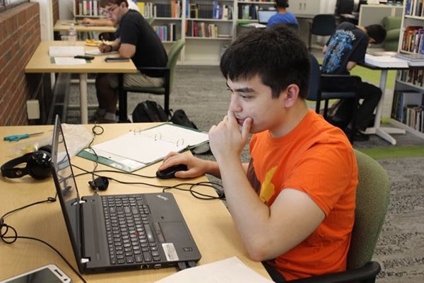 Computer Science major Roy Van Liew studies quietly in the UMass Lowell Honors College