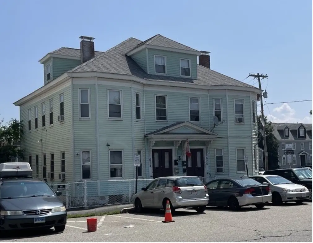 Picture of the front of 624-626 Central Street, two and half story house.