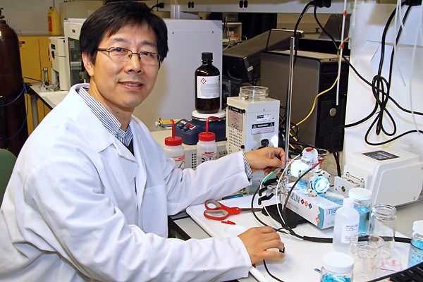Assoc. Prof. Fuqiang Liu conducts research at the Electrochemical Energy Laboratory