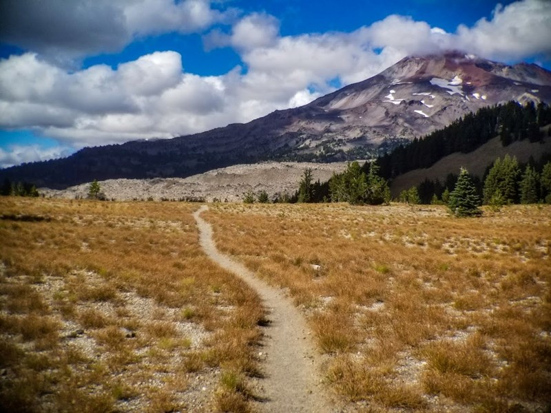 A path leading up to a mountain on the Pacific Crest Trail