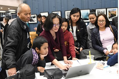 UML Assoc. Dean and Co-director of the Center for Asian American Studies Sue Kim demonstrates how to navigate the Southeast Asian Digital Archive