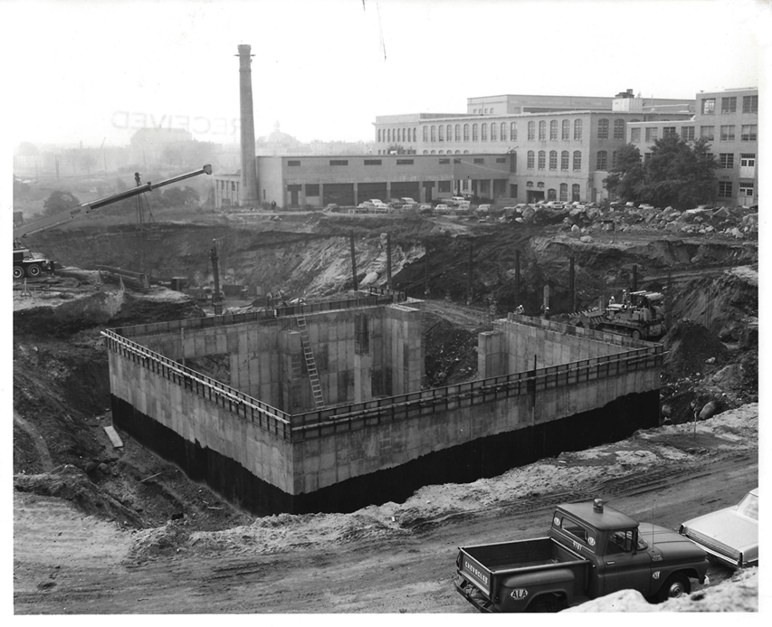 Black and white photo from 1966: cement foundation for the  particle accelerator target room underground.