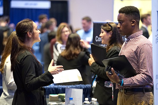 A student talks to a recruiter at the accounting career fair