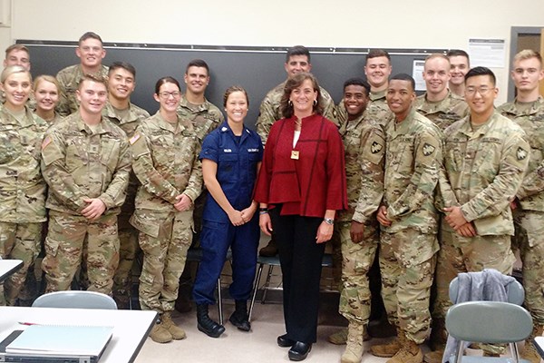 Liz Altman poses with cadets in her class at West Point