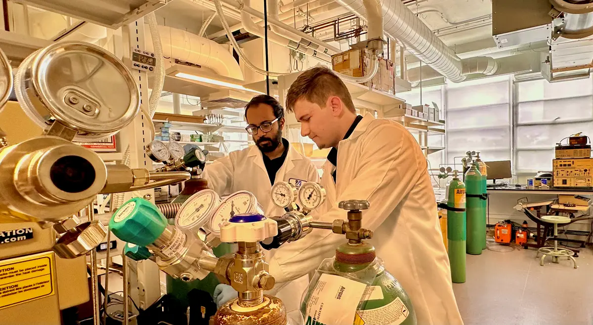 Ph.D. students Ahmed Saleh Khan and Ahmed Ibreljic at work in Electrical Engineering Assistant Professor Anhar Bhuiyan's lab.