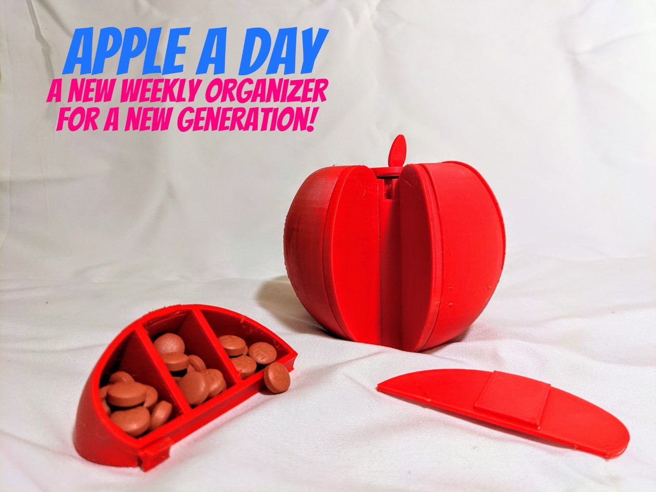 Team Apple a Day’s prototype of their product. It consists of a red apple with several sections, each of which could be used to hold daily medications