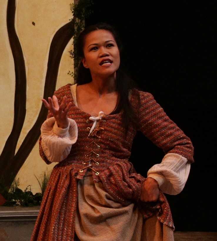 Student performing in As You Like it in 2012.