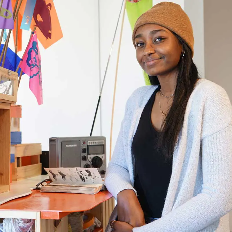 Lana Bashir seated at a desk