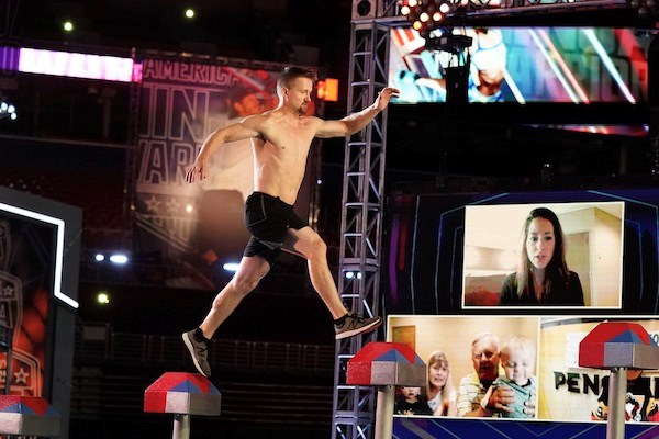 Barry Goers crosses steps during the American Ninja Warrior competition