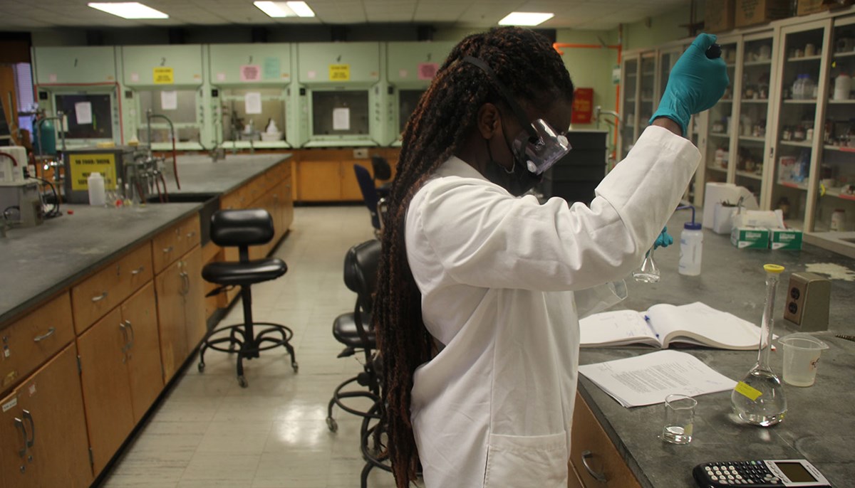 Benedicta Agyemang-Brantuo works in a lab