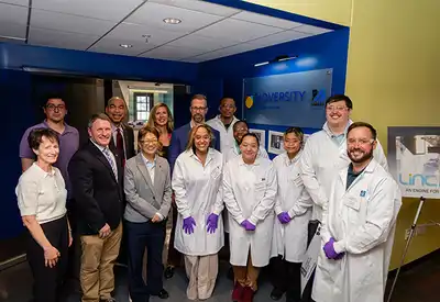 Participants of the Bioversity biotech workforce traning program opened a new lab surrounded by UMass Lowell leaders, guests and industry professionals.