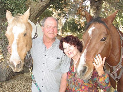 Joe Blonski ’78 and his wife, Debbie Hauser ’79, ’80, with their horses