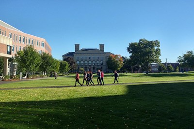 Students walk across south quad