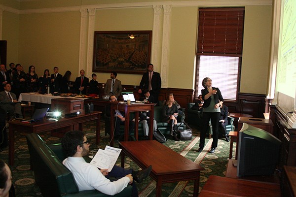 Juliette Rooney-Varga presents at the State House