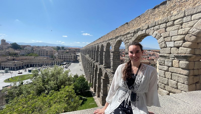 Cameron McKenzie in the Roman aqueduct in Segovia, Spain through the UMass Lowell Study Abroad program.
