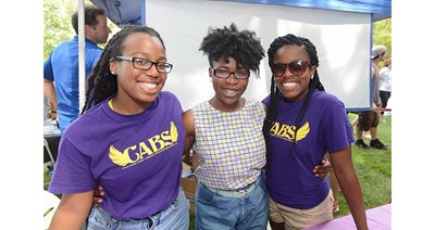 3 girls from the Christian Analytical Bible Study (CABS) pose for a photo.