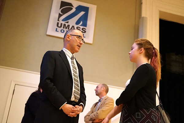 Carl Spector speaks with student Emma Hargraves after the teach-in