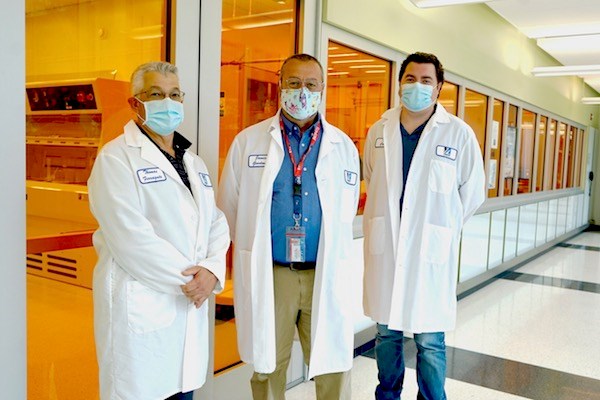 ETIC staff members Thomas Ferraguto, Jay Goodman and Patrick Casey outside the clean room