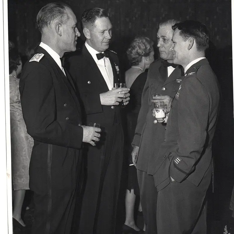 Circa 1953 Air Force Reserve Officers Training Corps members gather at a celebration.