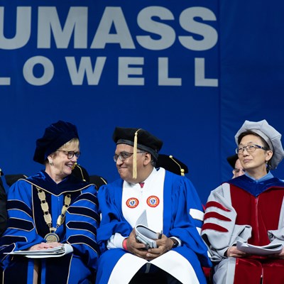 Chancellor Jacqueline Moloney, Dr. Ashish Jha, and Vice Chancellor Julie Chen share the Commencement 2022 stage.
