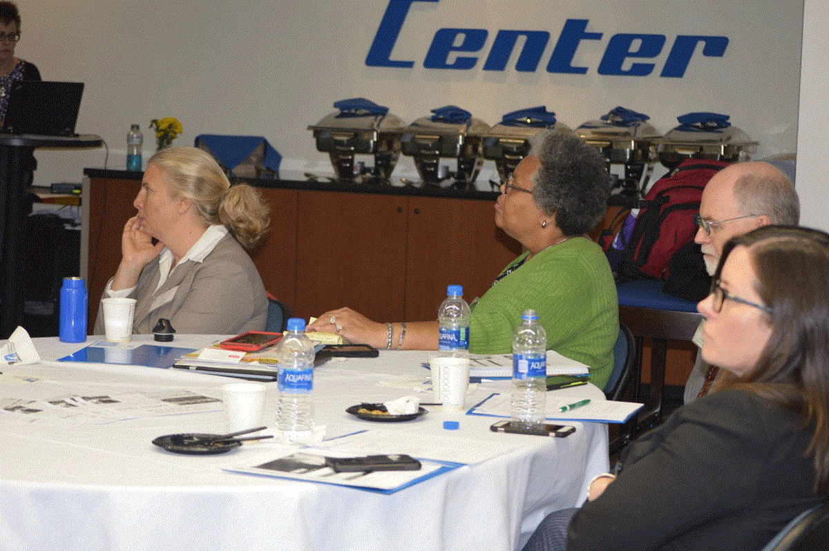 Coral Roloef, Presenter, Sharon Beard, NIEHS Representative and David Turcotte, Principal Investigator TNEC are seated at a table at the TNEC Advisory Board meeting. It was held in the Tsongas Center.