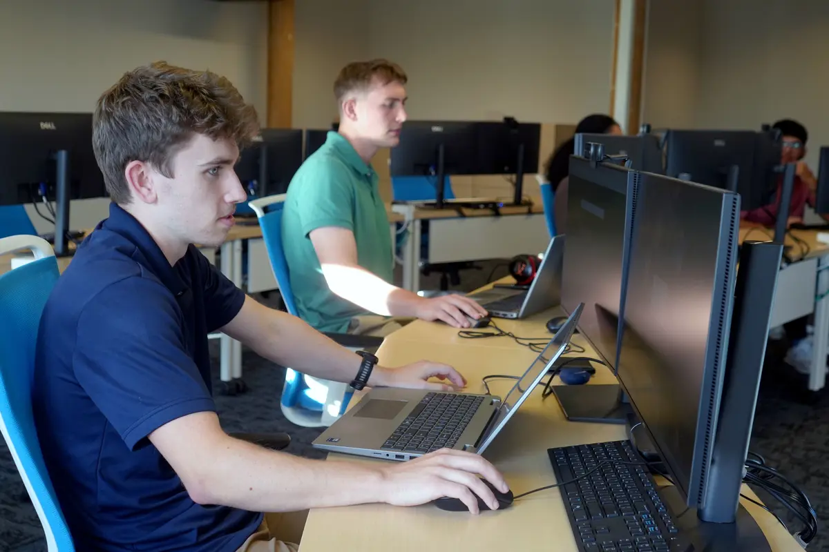 Michael Leahy completes a task on the computer.