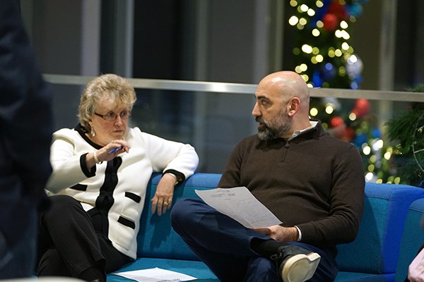 Judges Michelle Silveira and Vasilios Roussous deliberate at UCrossing