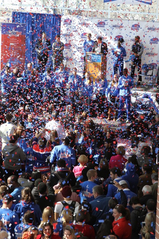 Confetti flies over several hundred students, faculty, staff, alumni and fans after UML announced that all of its athletic teams were Division I members in 2013