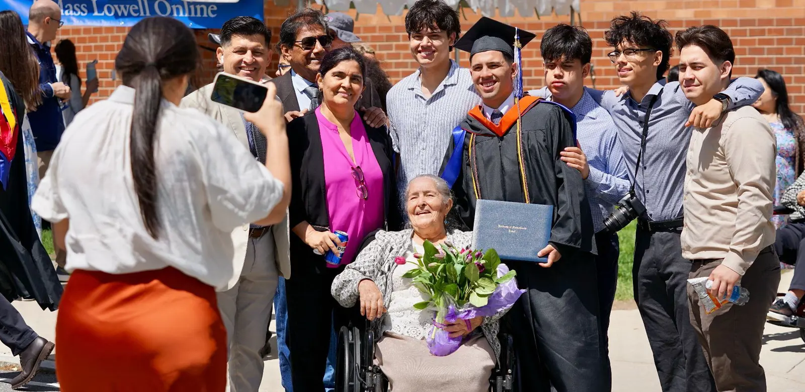 Family poses for photo on Commencement day