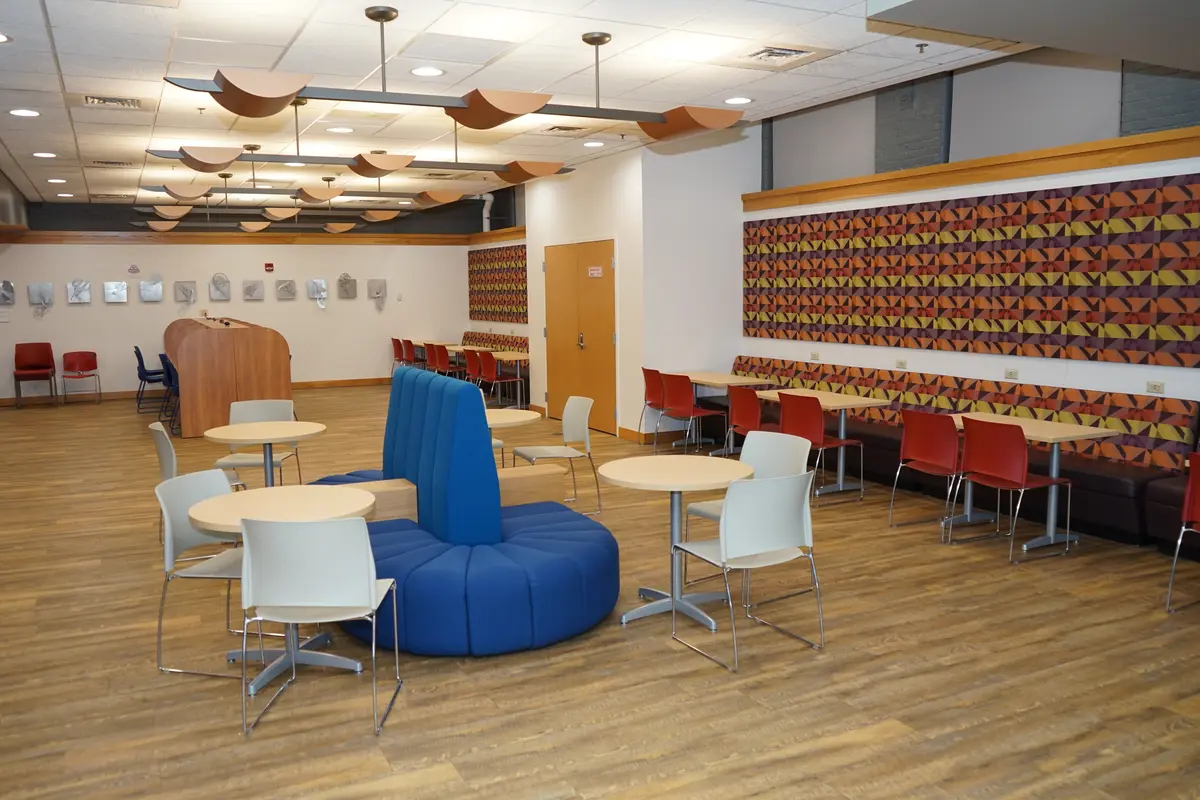 A recently renovated student lounge with new furniture.