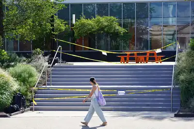 A rendering of a new wing to a college science building.