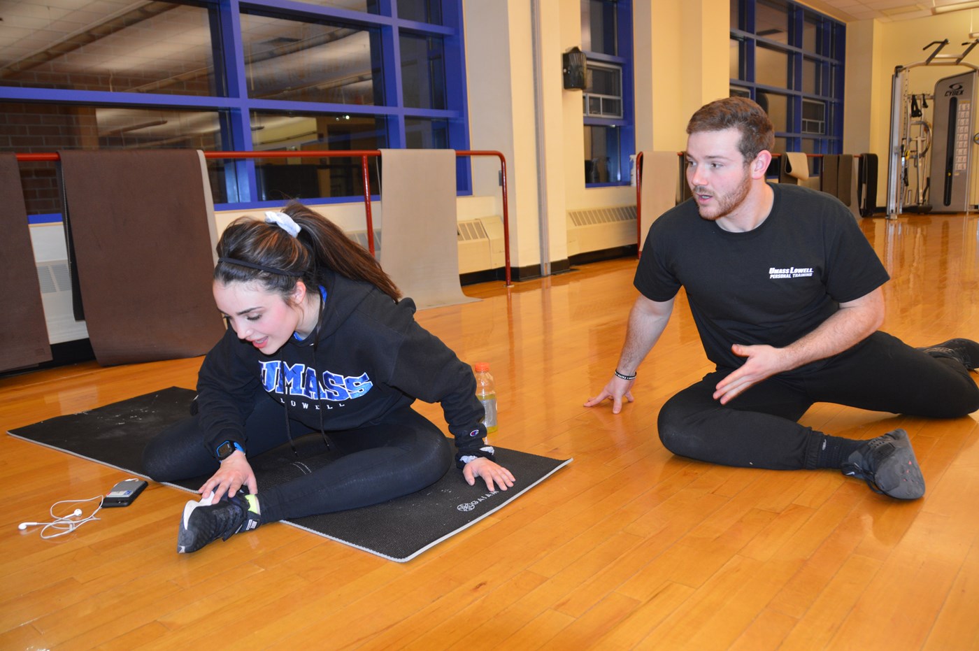 Student personal trainer instructing client inside CRC studio.