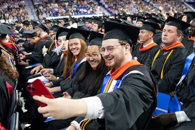 Engineering students take a selfie at UMass Lowell Commencement