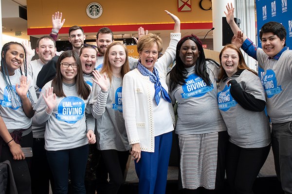 Chancellor Jacquie Moloney celebrates with students