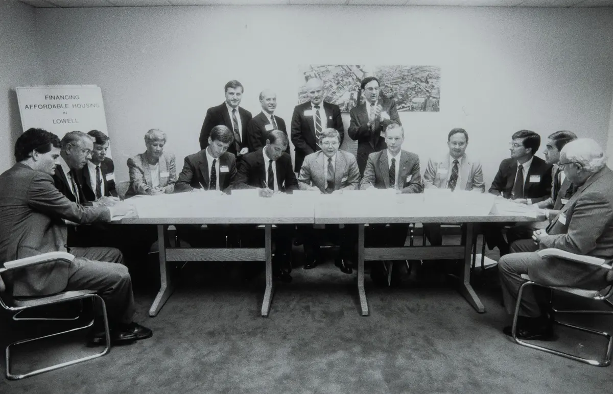 1989 Photo of the Development and Financial Corporation meeting to discuss Financing Affordable Housing in Lowell.