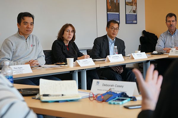 E Ink executives Frank Ko, Lynne Garone, Simon Nip and Scott Bull listen to UMass Lowell's Arlene Parquette talk about strategic partnerships